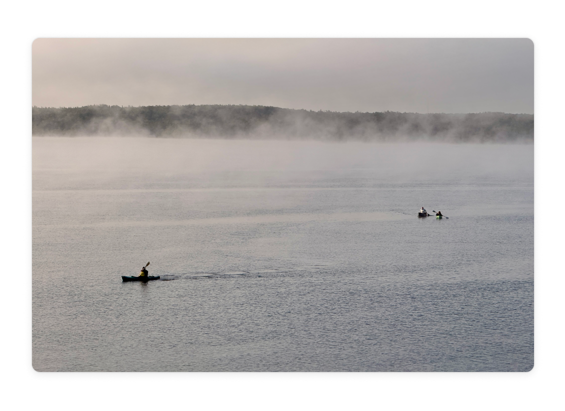 Camp A2X attendees enjoying a morning kayak and canoe