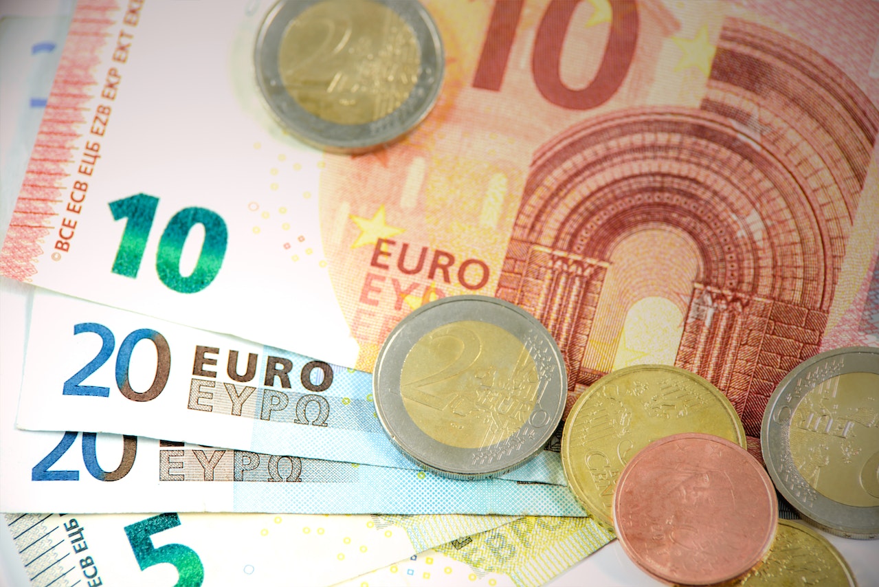 A picture of euro notes and coins