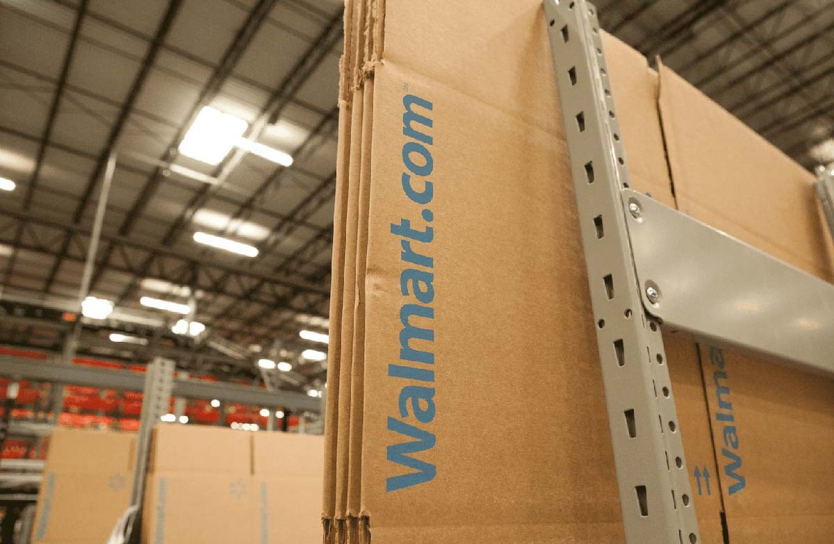 A close up of a flattened Walmart.com box inside the Walmart fulfillment center